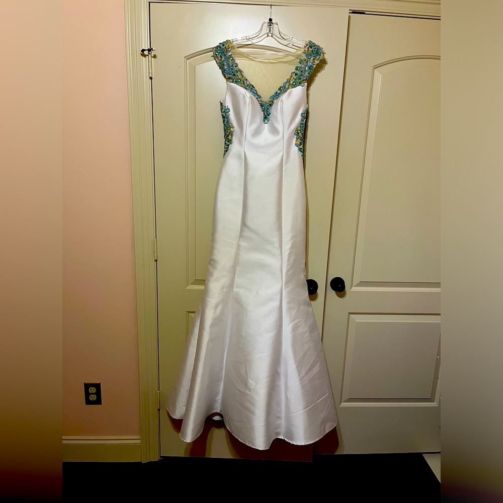 Beautiful white ball gown with blue, green, and gold beading . Never worn.